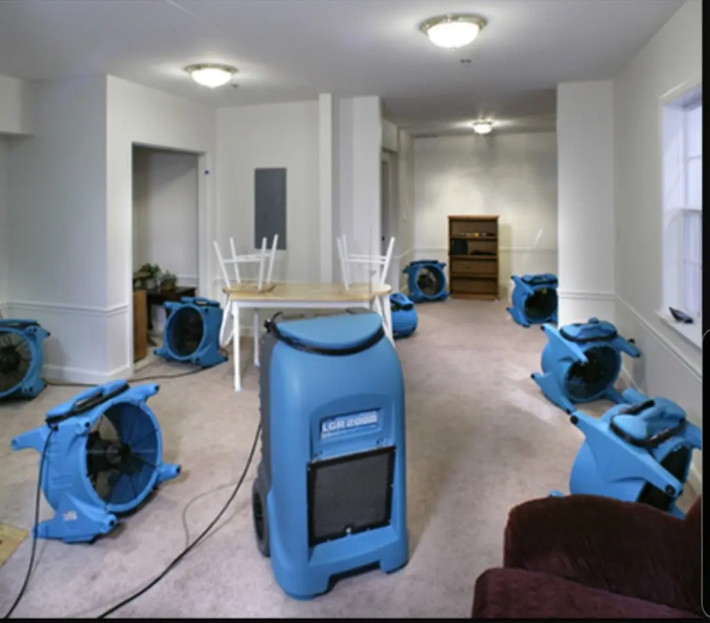 Air movers and dehumidifier setup for Water Extraction & Removal in Marquette